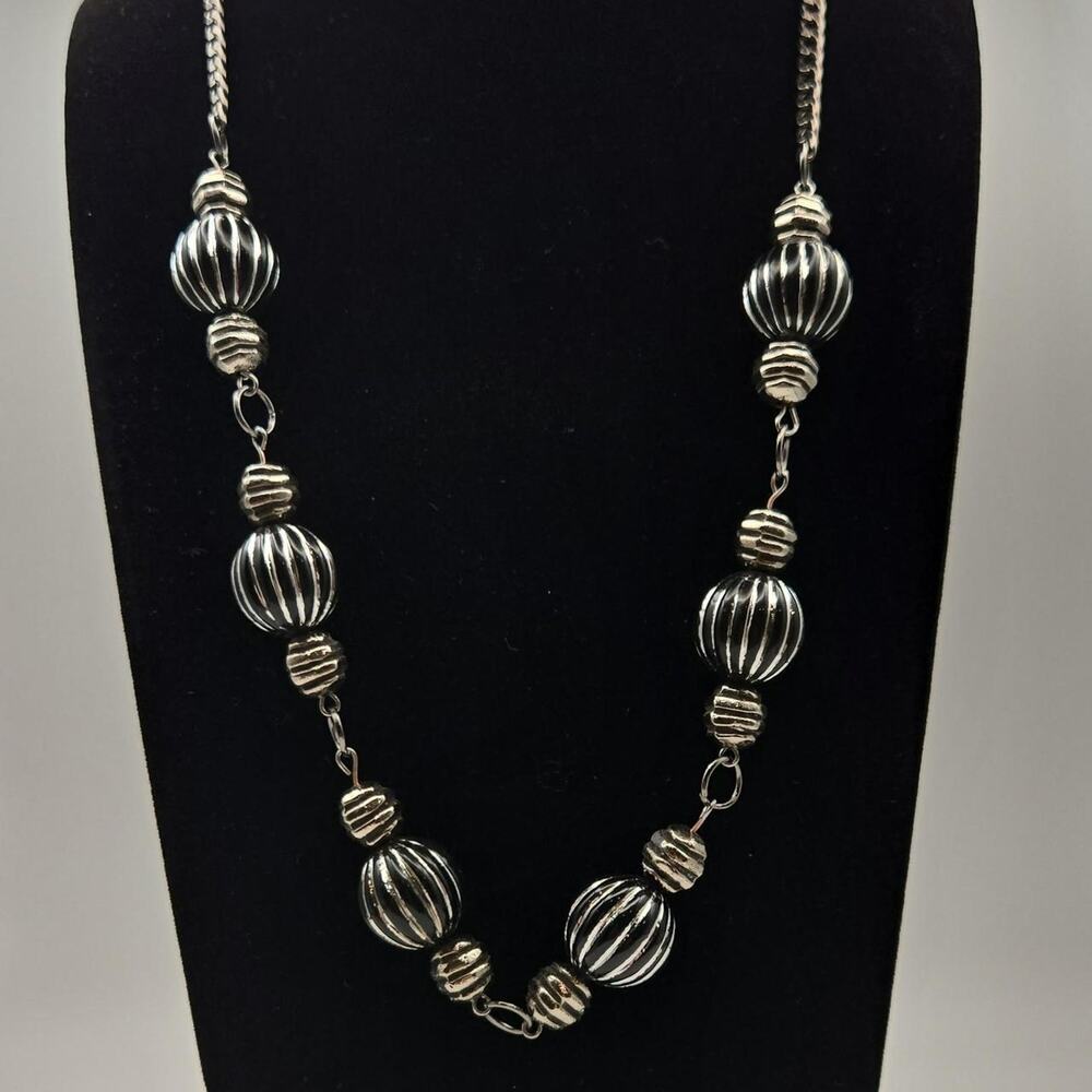 Silver tone beaded necklace
